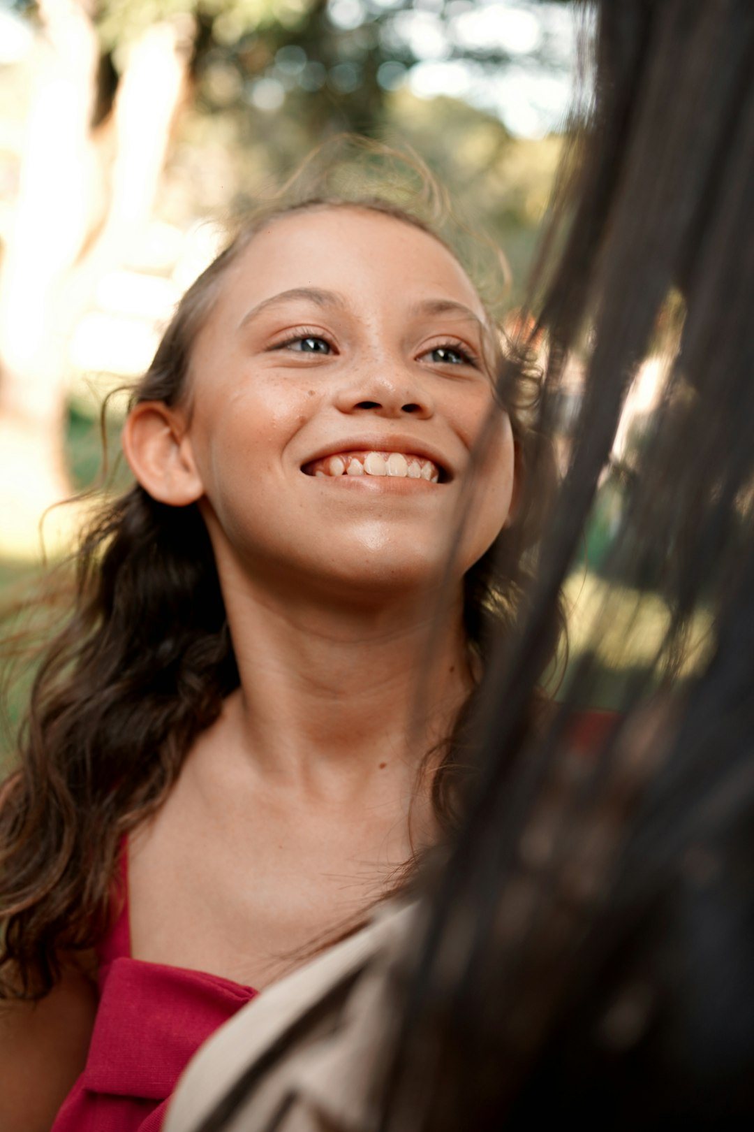 Girl smiling outdoors